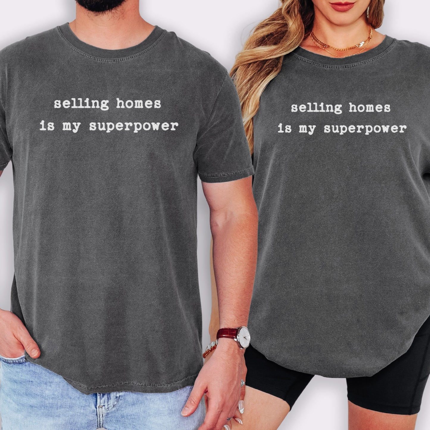 Two people wearing gray t-shirts with the text "selling homes is my superpower" printed on them.