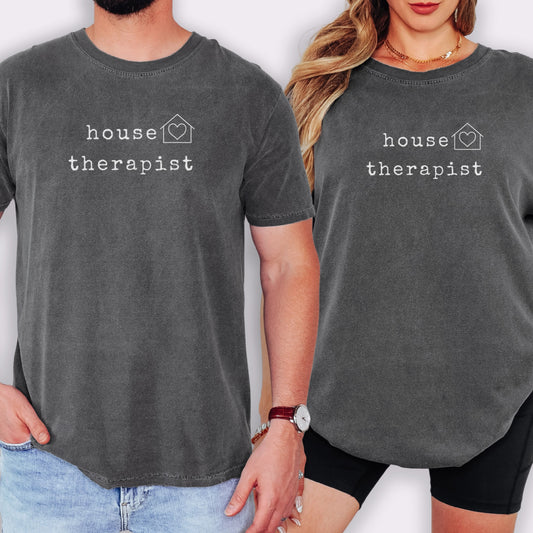 Two people wearing gray t-shirts with the text "house therapist" printed on them.