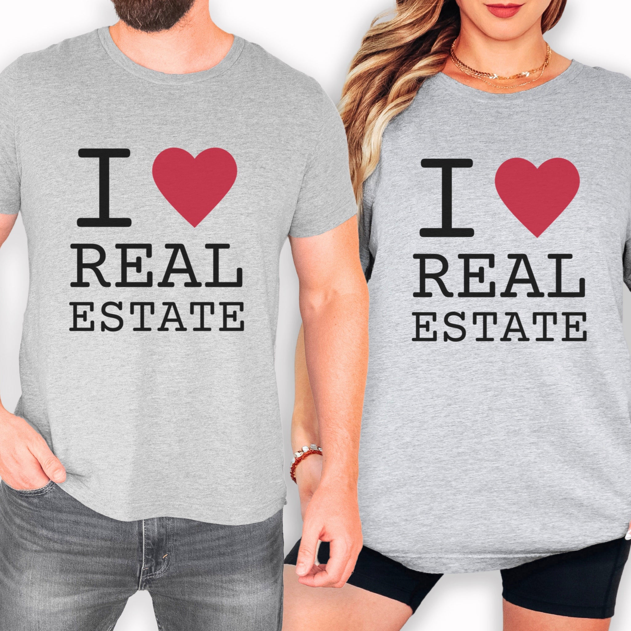 two people wearing gray t-shirts with the text "I ♥ REAL ESTATE" printed on them.