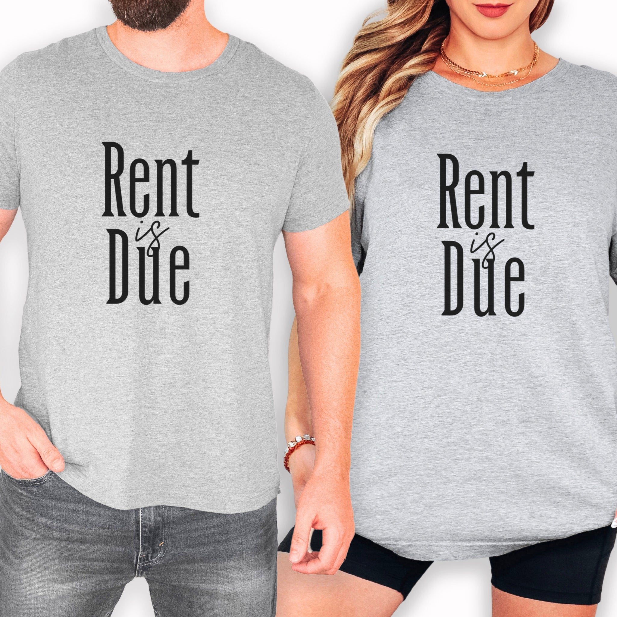 A man and a woman wearing matching gray t-shirts with the text "Rent is Due" printed on them.