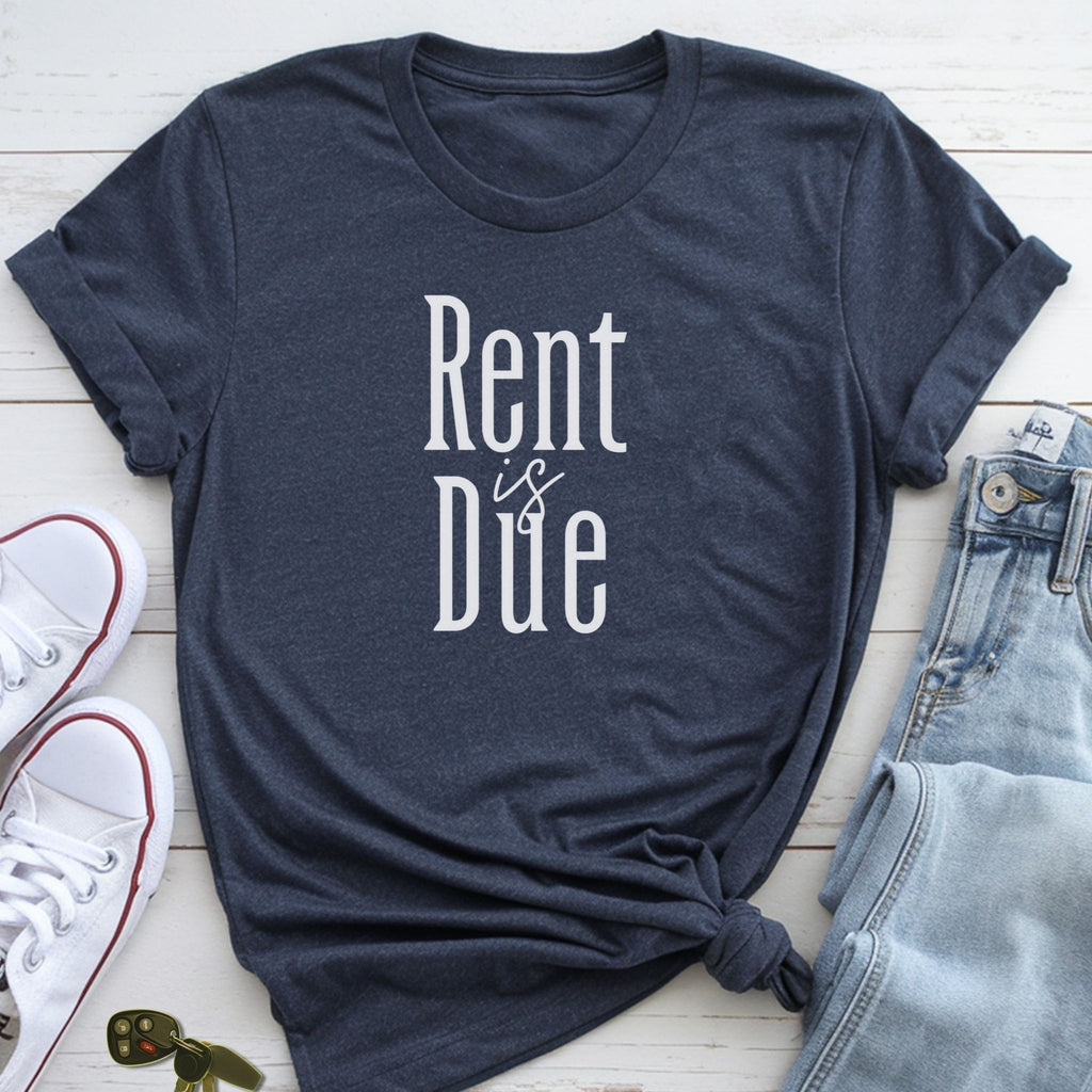 A dark blue t-shirt with the text "Rent is Due" printed on it, along with a pair of jeans and white sneakers.
