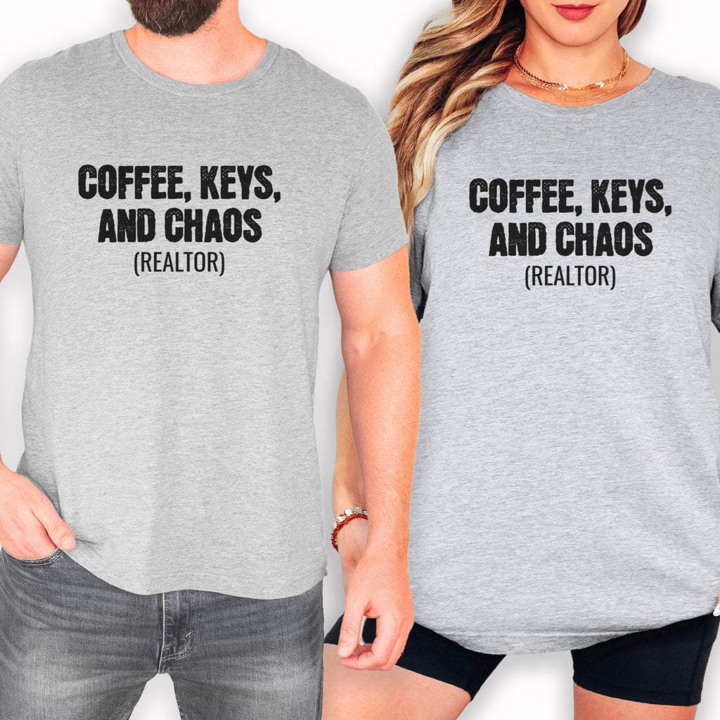 two people wearing gray t-shirts with the text "COFFEE, KEYS, AND CHAOS (REALTOR)" printed on them.
