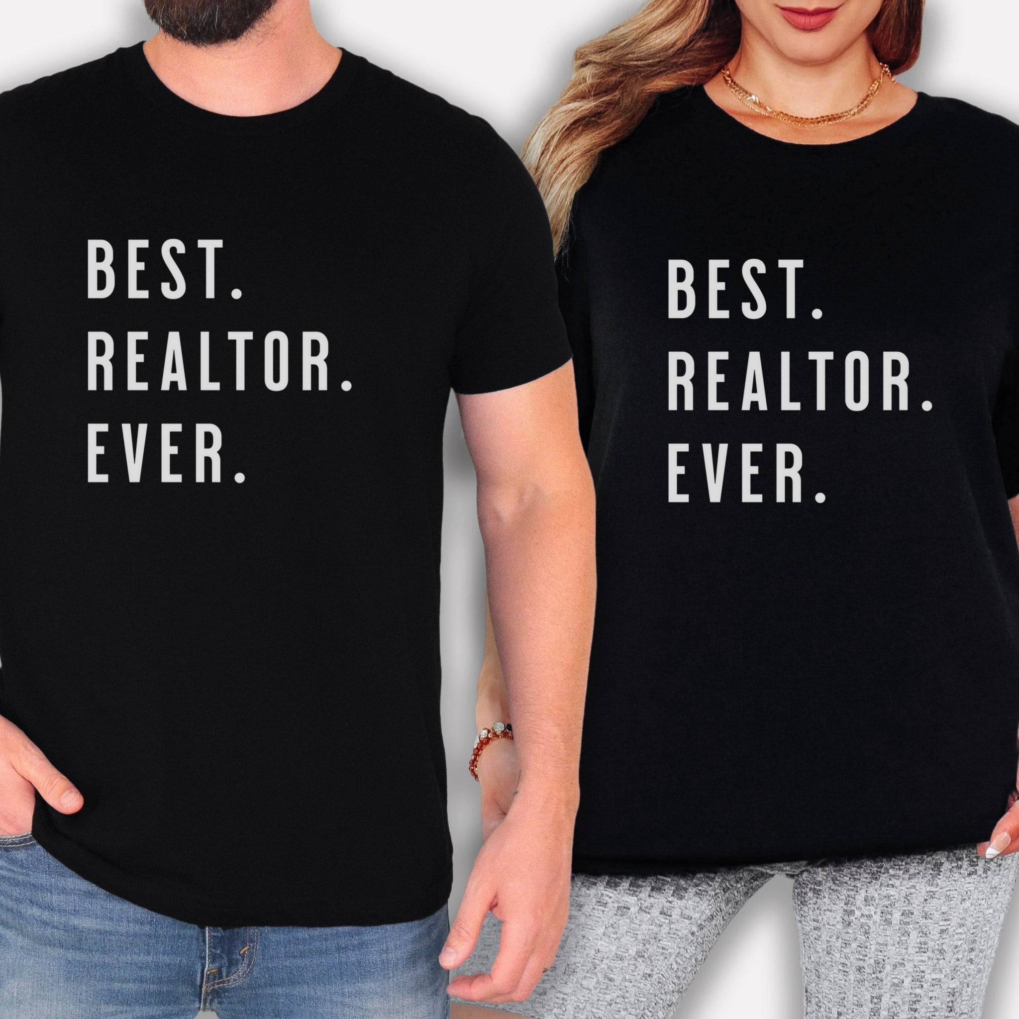 A man and a woman wearing black t-shirts with the same text printed on them.