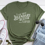 a green t-shirt with white text, a pair of sunglasses, a pair of jeans, and a pair of white sneakers.