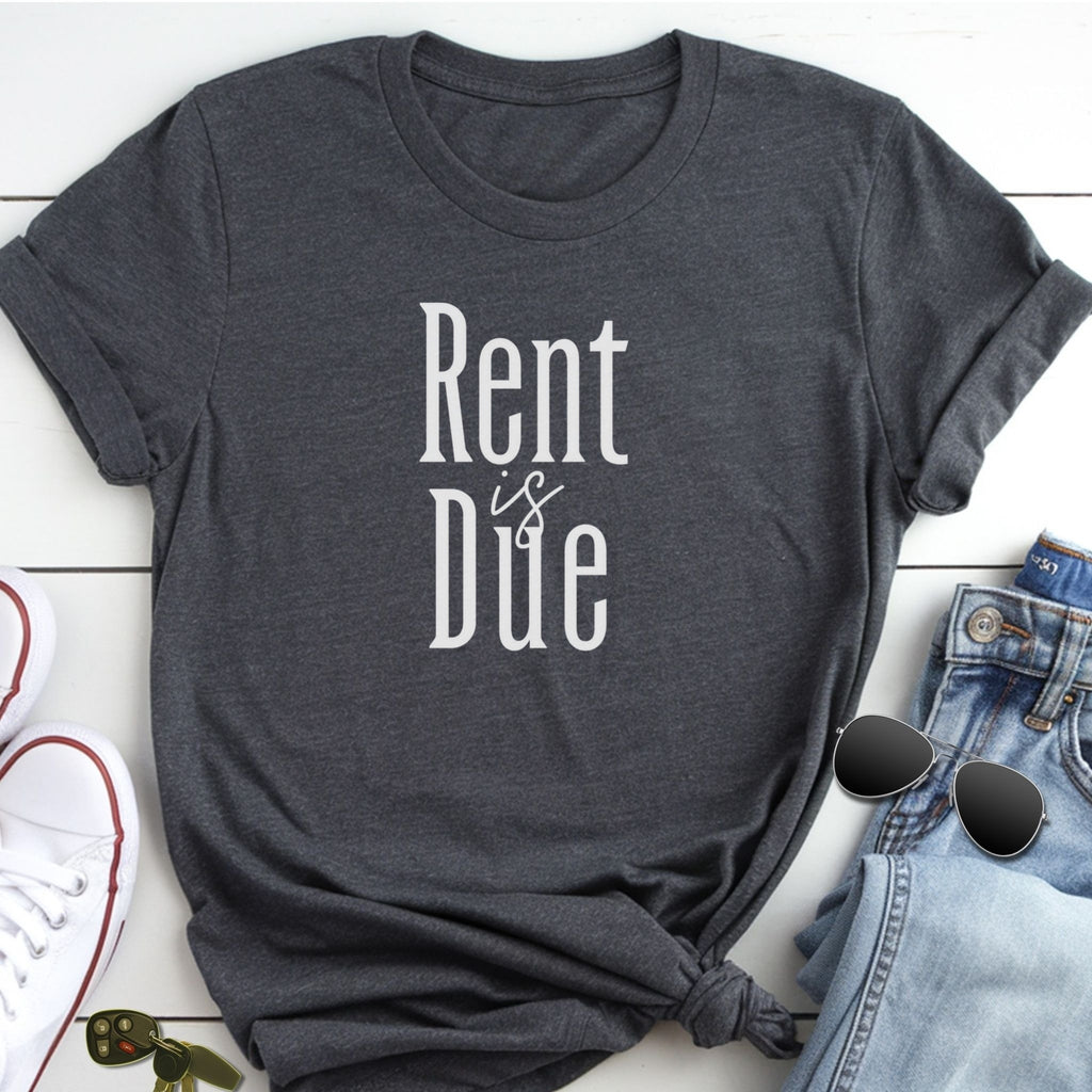 A gray t-shirt with the text "Rent is Due" printed on it, along with a pair of jeans and sunglasses.