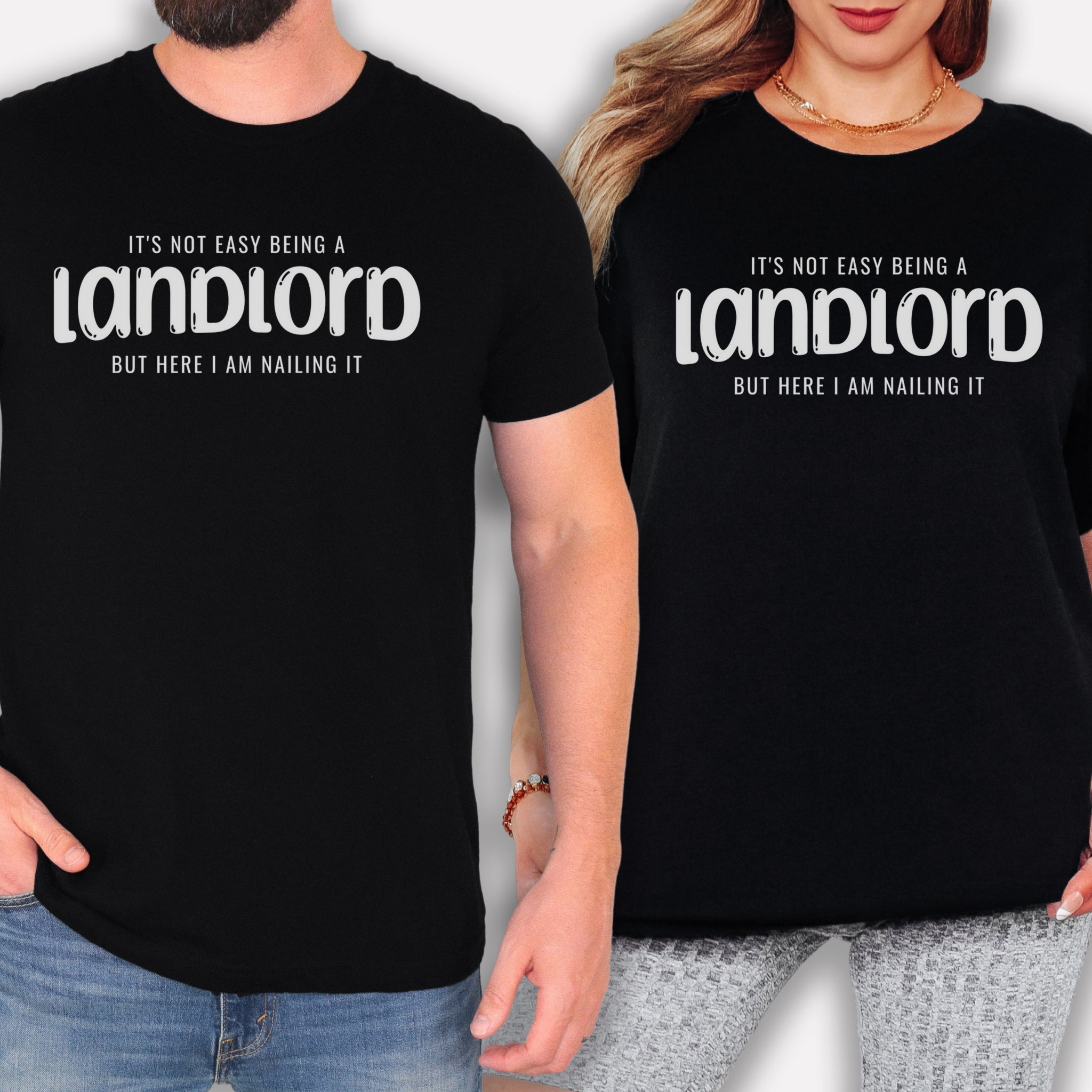 Two people wearing black t-shirts with white text.
