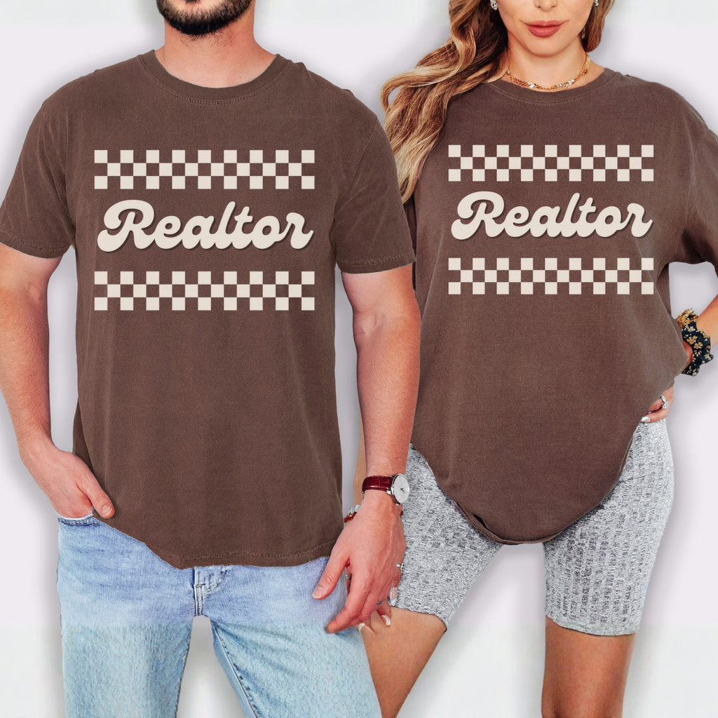 A man and a woman wearing matching brown t-shirts with the word "Realtor" printed on them.