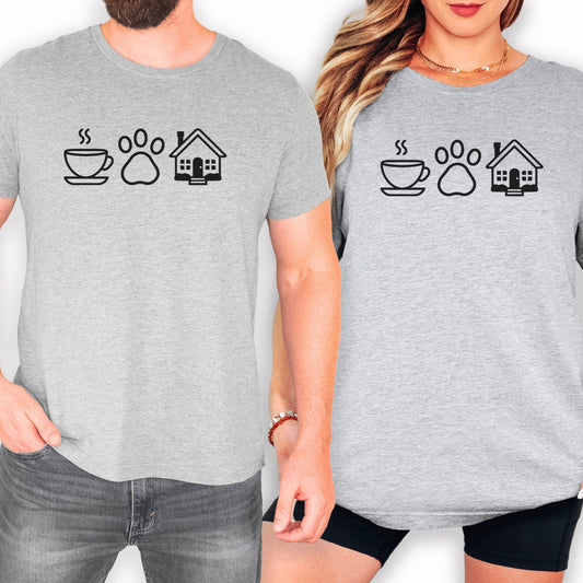 a man and a woman wearing matching gray t-shirts with black icons representing coffee, a house, and a dog.