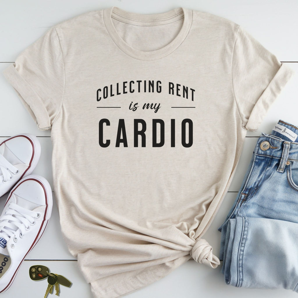 A beige t-shirt with the text "COLLECTING RENT IS MY CARDIO" printed on it, along with a pair of jeans and sneakers.