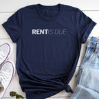 A navy blue t-shirt with the text "RENT IS DUE" printed on it, along with a pair of jeans and white sneakers.