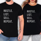 Two people wearing black t-shirts with the same text printed on them.